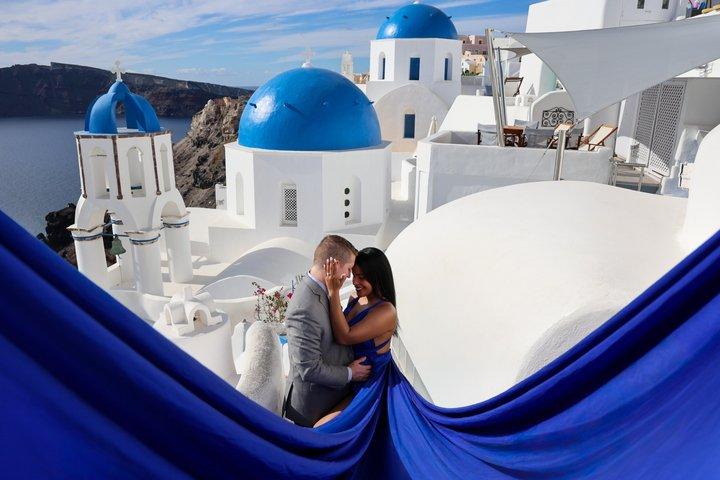 Flying Dress Photoshoot in Santorini, Blue Domes and Caldera View