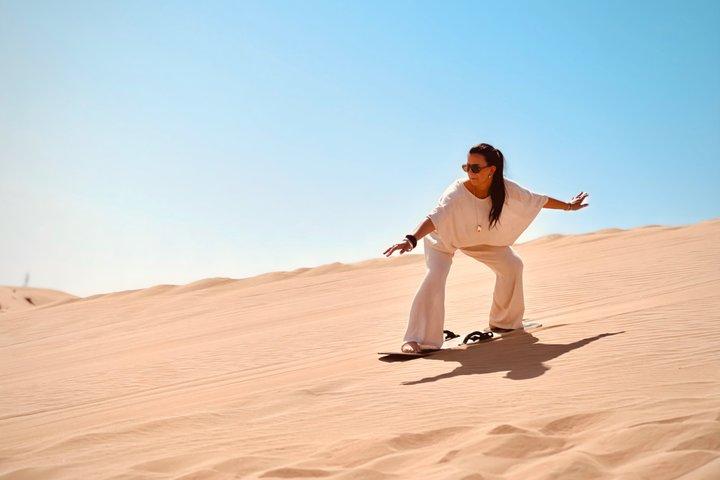 Abu Dhabi Evening Desert Safari: BBQ Dinner, Camel Ride & Shows