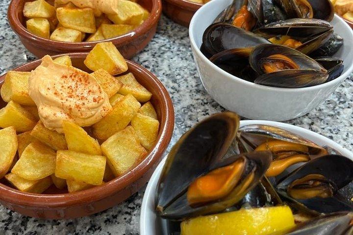Paella cooking class - Local Market tour, Tapas & Wine