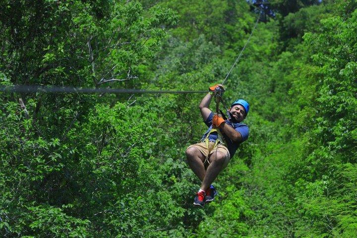 Unforgettable Zipline experience with cenote, snack and transport