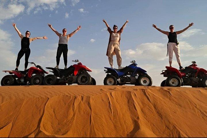 Red Dunes Sandboarding Quad Bikes and Camel Ride Adventure