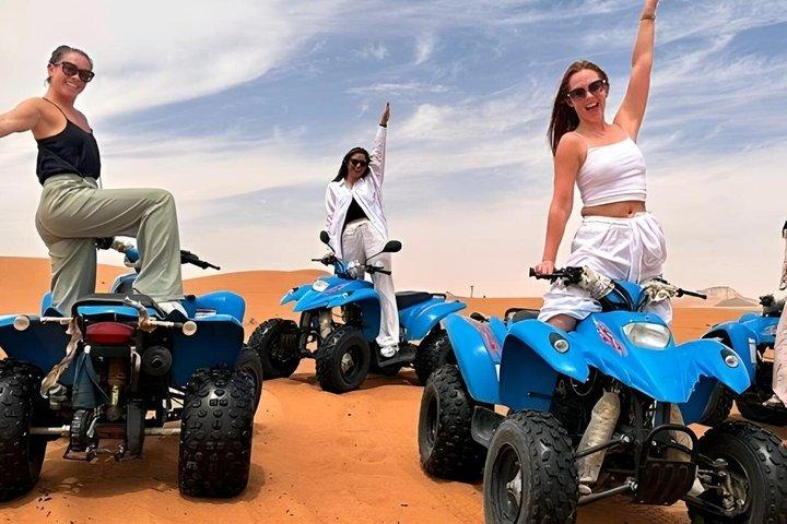 Red Dunes Sandboarding Quad Bikes and Camel Ride Adventure