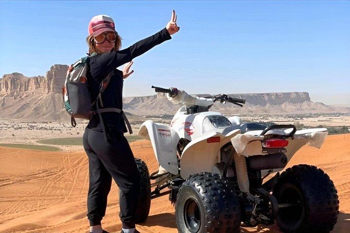 Red Dunes Sandboarding Quad Bikes and Camel Ride Adventure