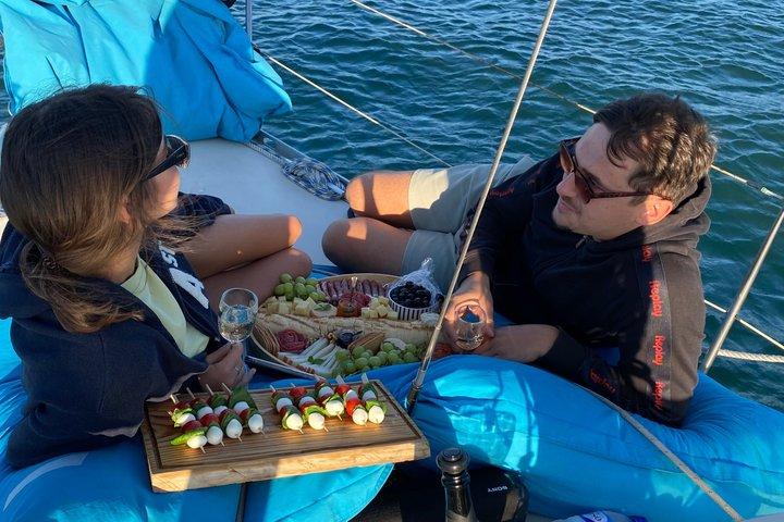 Lisbon: "Sunset" and "Day Tours" by boat, with drinks and Music.