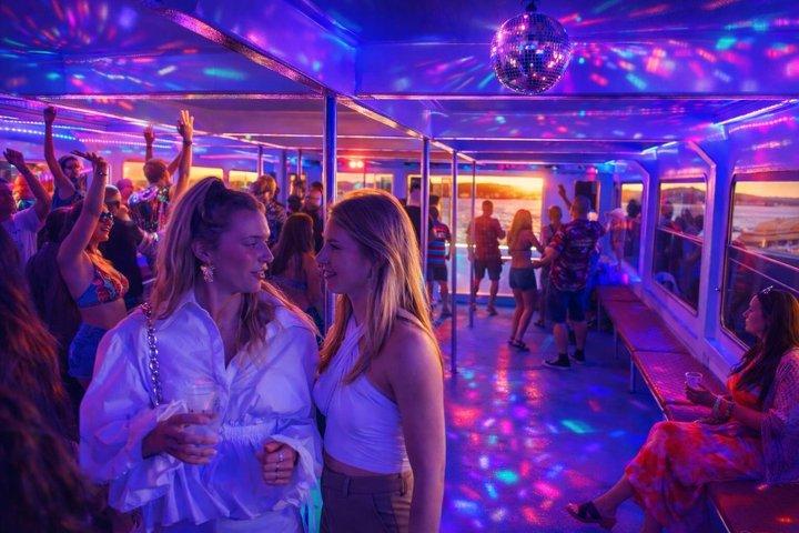 Boat party at sunset with DJ and open bar