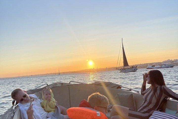 Lisbon Sunset Cozy Boat Cruise with Open Bar & Pizza