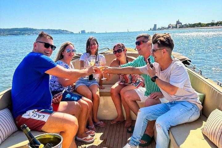 Lisbon Sunset Cozy Boat Cruise with Open Bar & Pizza
