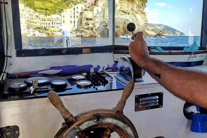 Cinque Terre daytime boat tour with a traditional ligurian gozzo