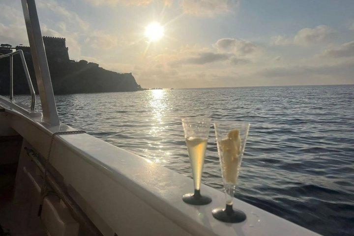 Sunset aperitif on the coast of Ischia by boat with skipper
