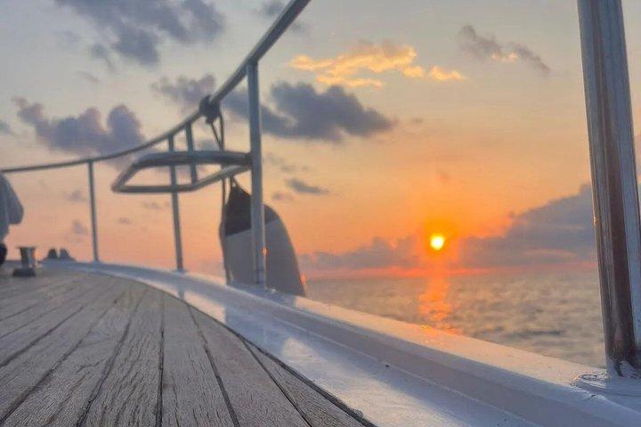 Sunset aperitif on the coast of Ischia by boat with skipper