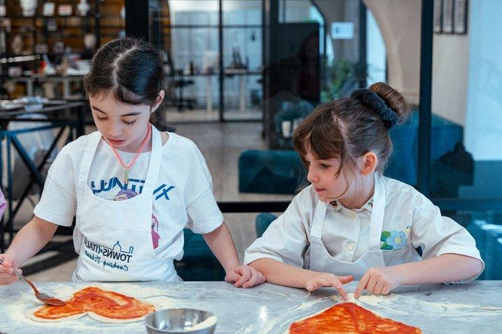 Rome Pizza or Pasta Cooking Class Gelato Tasting & Unlimited Wine