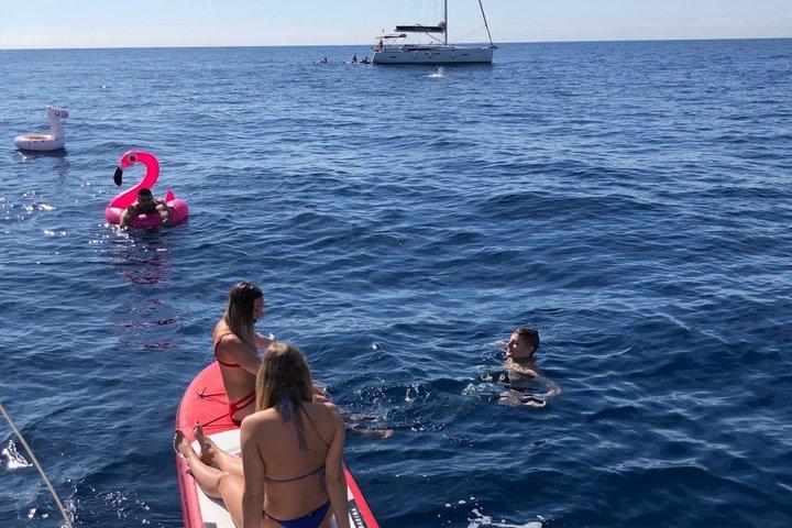 Barcelona Day & Sunset Sailing: Open Bar, Local Tapas & Swim