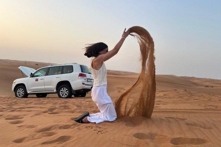 Private Morning Desert Safari with Camel Ride Falcon Photos