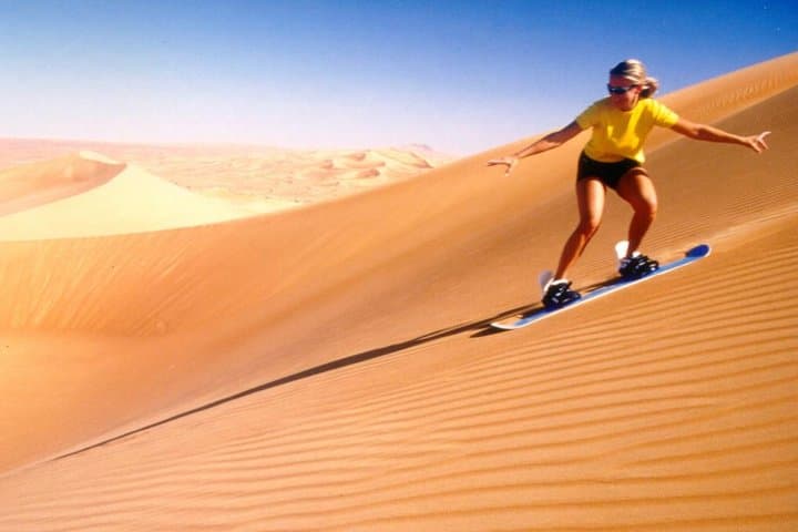 Private Morning Desert Dune Bashing, Sandboarding, Camel Riding