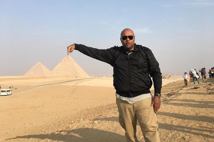 Full day private tour to great pyramids Sphinx Egyptian Museum and Nile boat ride
