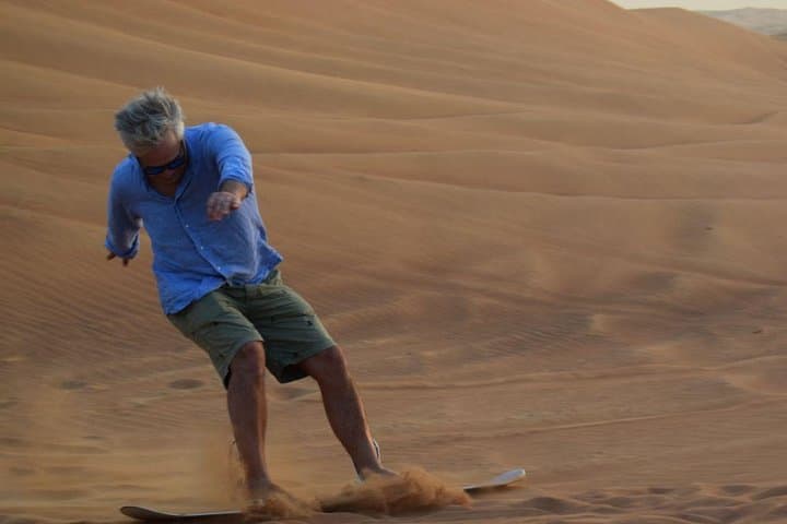 Dune Bashing with Quad Bike and Sand Boarding from Dubai