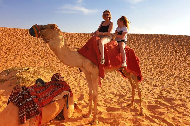 Morning Desert Safari with 4x4 Dune bashing, Camel Ride and Sandboarding