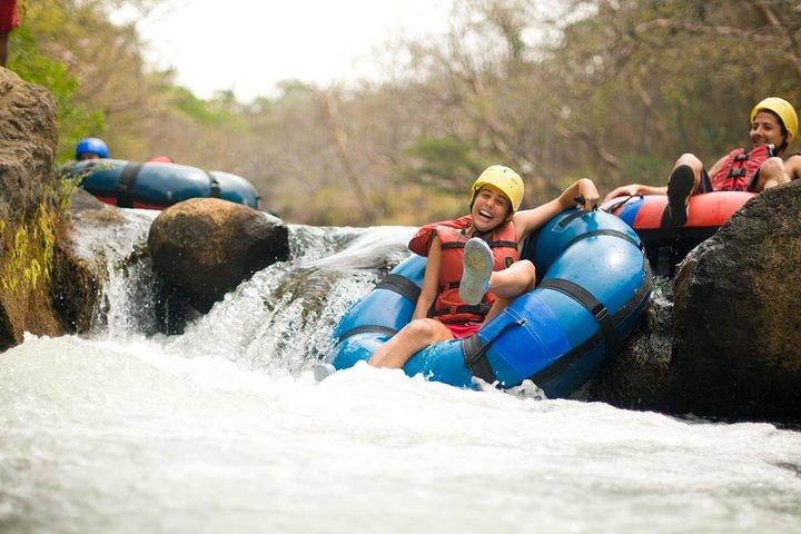 Guachipelin Zipline, River Tubing, Horseback Ride, Hot springs & Lunch Combo