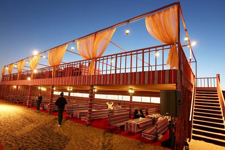 Evening Desert Safari Dubai With Buffet, Dune Bashing, Camel Riding, and Tanura