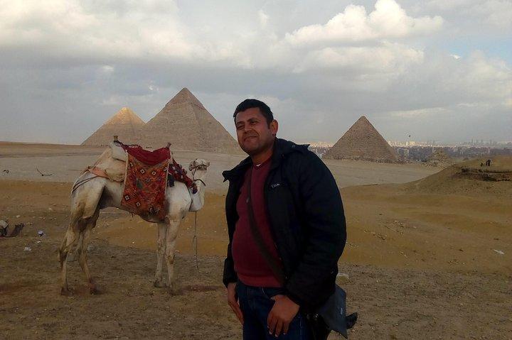 Giza pyramids sunset camel ride with local dinner
