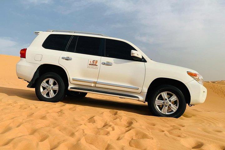 Morning Dubai Red Dunes Safari With Camel Ride & Sand boarding