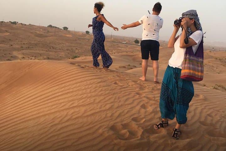 Evening Red Dunes Desert Safari: BBQ Dinner & Adventure Awaits!