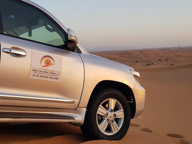 Morning Desert Safari with Camel Ride and Sandboarding