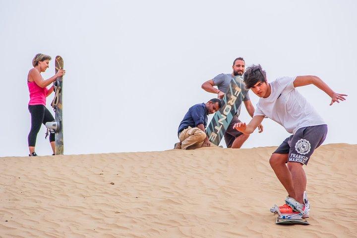Morning Dubai Desert Safari with Camel Ride & Sand boarding