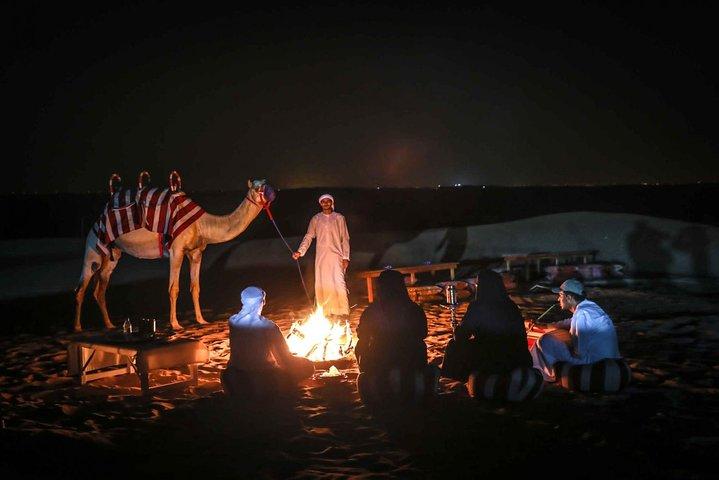 Overnight Desert Safari with Dune Bashing, Belly Dance, Camel Ride and Breakfast