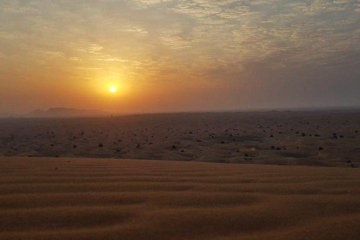 Sunrise View Desert Safari with Dune Bashing and Sand Boarding