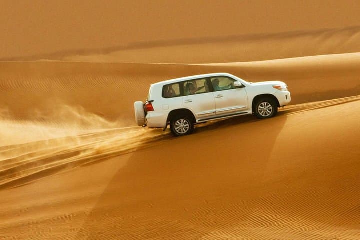 Private Morning Desert Dune Bashing, Sandboarding, Camel Riding