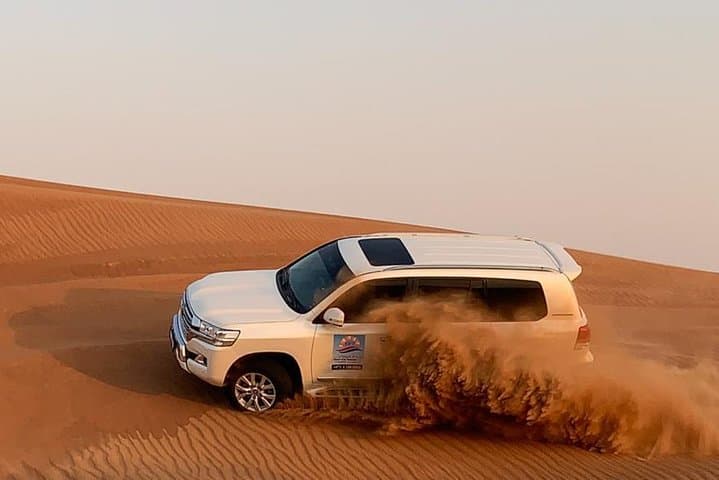 Dubai Desert Safari Morning with Camel Ride and Sand Boarding