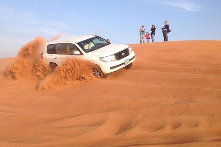 Morning Red Dunes Desert by Quad Bike, Dune Bashing, Camel Ride & Sandboarding