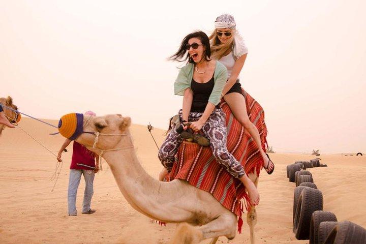 Private Dubai Desert Safari with Barbecue Dinner and Camel Ride
