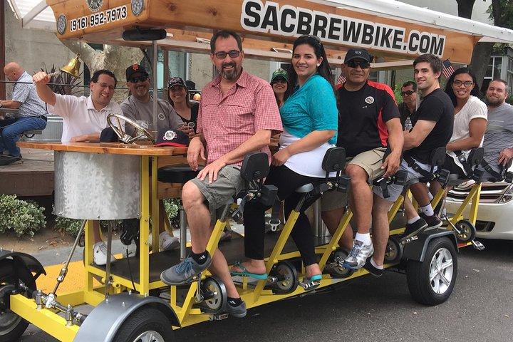 Pedal, Drink, and Bar hop through Sacramento on a 15 seat Beer Bike