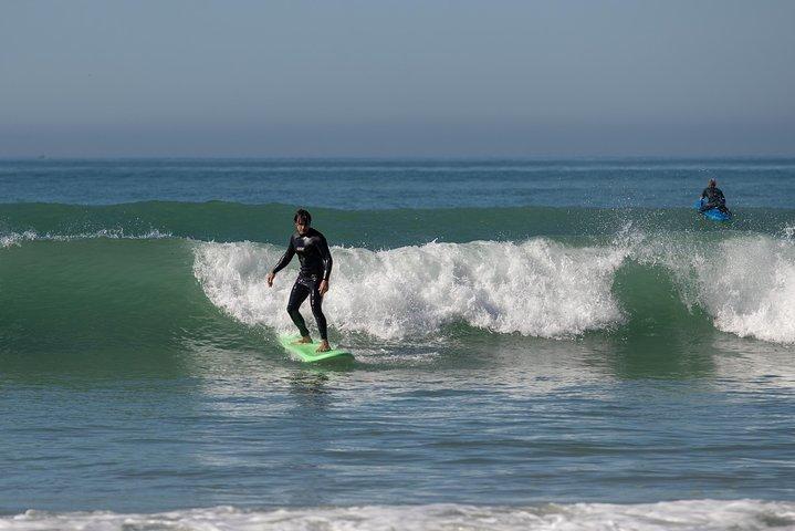 Join our Surf Day trips and learn surfing!