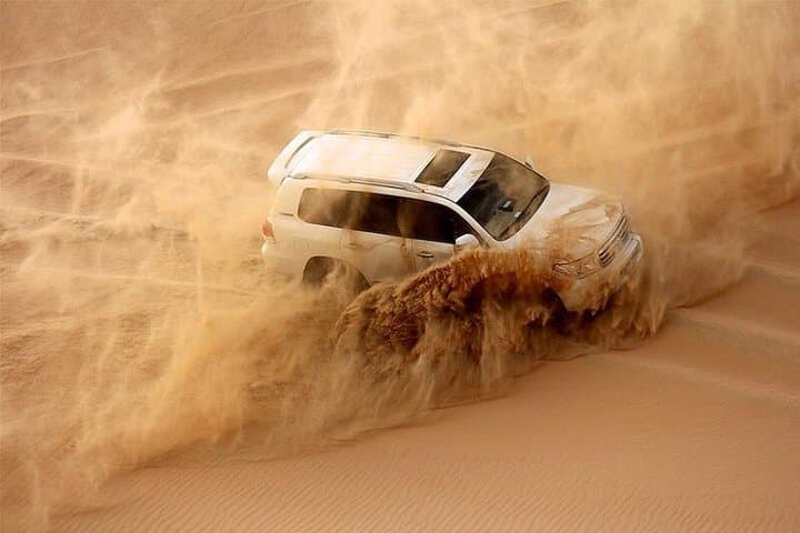 Morning Red Dunes Safari: Quad Biking, Sandboarding & Camel Ride