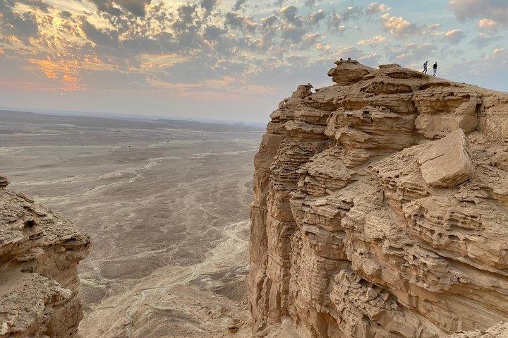 Edge of the World with 4x4 vehicle, camels and stargazing