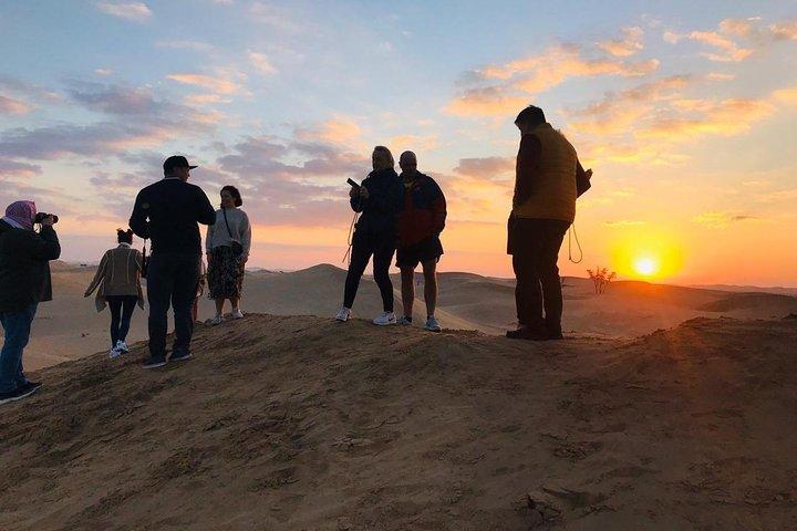 Sunrise Desert Safari with Quad bike and Sandboarding,
