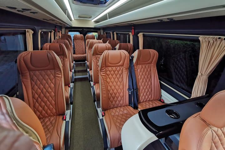 AIRPORT TRANSFER to/from hotel (up 14 in a luxurious Minibus )