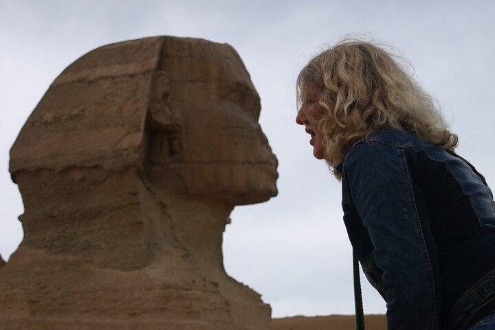 Half Day tour to Giza Pyramids with Camel ride and lunch