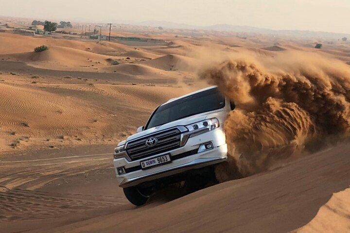 Private Morning Red Dune Safari with Camel Ride & Sandboarding