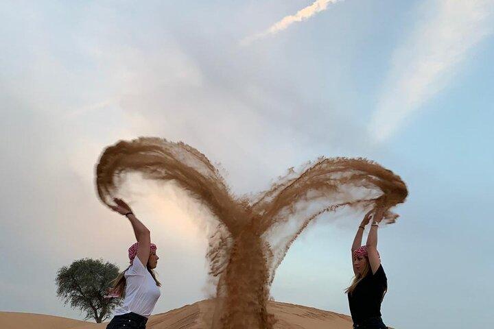 Desert Safari and Sandboarding with Dinner in Dubai