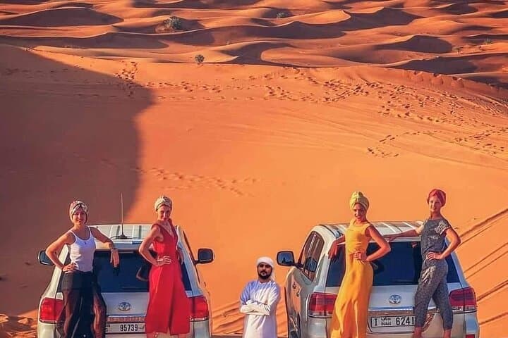 Private Desert Excursion with camel ride Sandboard & BBQ Dinner
