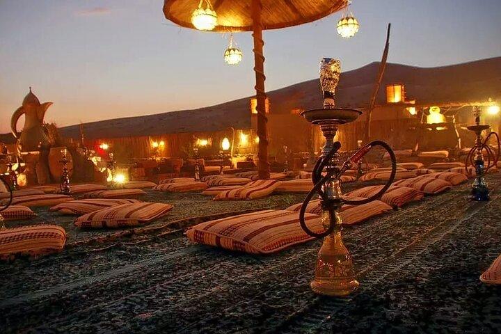 Overnight Desert Safari with Dune Bashing, Belly Dance, Camel Ride and Breakfast