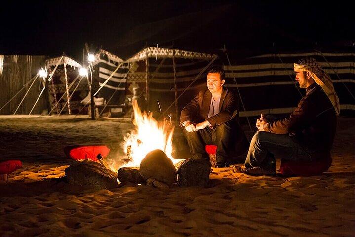 Overnight Desert Safari with Dune Bashing, Belly Dance, Camel Ride and Breakfast