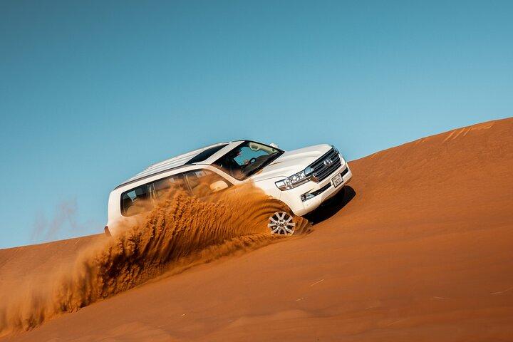 Dubai Desert Safari with Belly Dance, Fire Show and Tanura Show-The Full Package