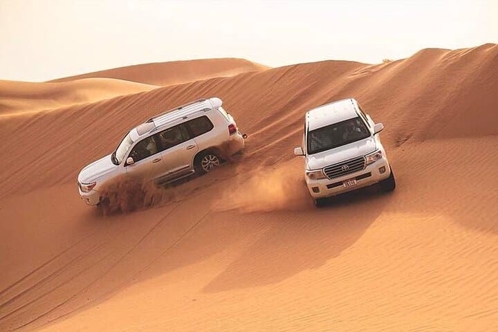 Red Dunes Dubai Desert Safari with Live show, Sandboarding & BBQ