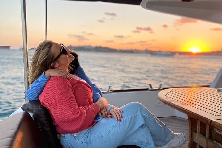 Bosphorus Sunset or Daytime Yacht Cruise with Snacks & Live Guide