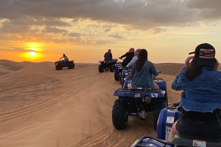 Premium Dubai Red Dunes Quad Bike Tour, Sandboard, Camel & BBQ